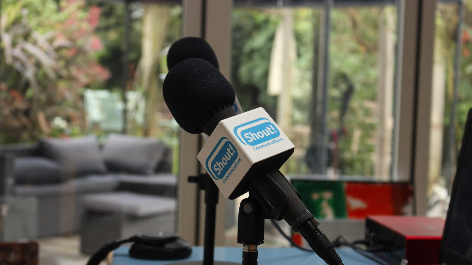 microphone with shout communications branding